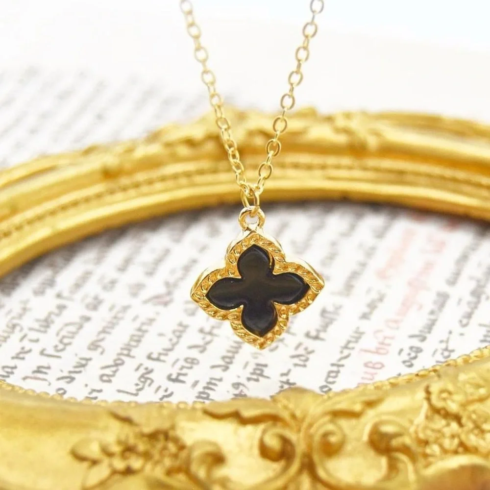 Gold Necklace with Black Clover Pendant